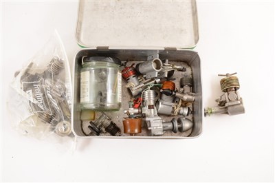 Lot 386 - Tin containing 10 engines of spares or repair.