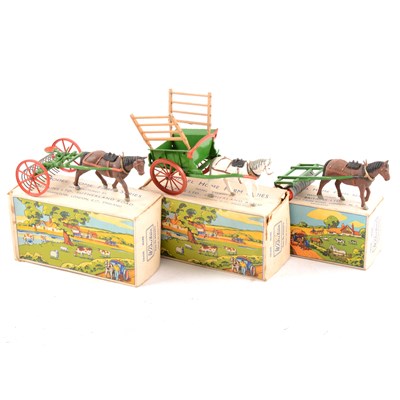 Lot 91A - Britains Farming Toys; no.9506 farm rake, no.9504 farm roller, no.9505 Tumbrel cart, all boxed.