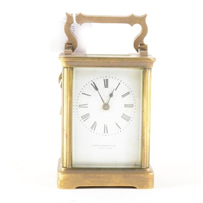 Lot 80 - Brass cased carriage clock, signed Curtis & Horspool, Leicester