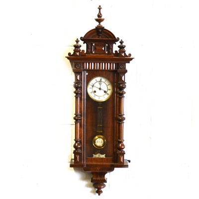 Lot 395 - A walnut cased Vienna wall clock, ...