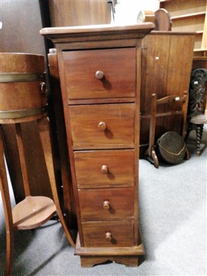 Lot 614 - A reproduction stained wood pedestal chest