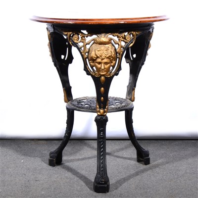 Lot 607 - A Britannia type painted cast iron pub table, ...