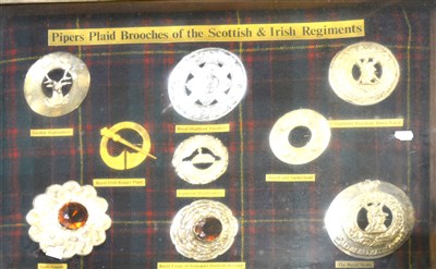 Lot 278 - Piper's Plaid, brooches of the Scottish and...