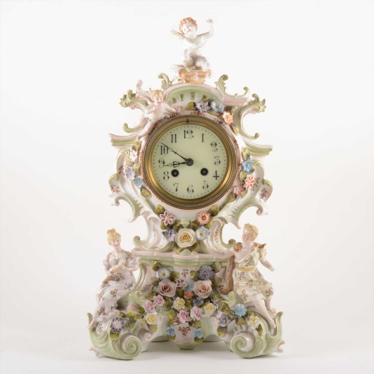 Lot 118 - A Continental porcelain mantel clock