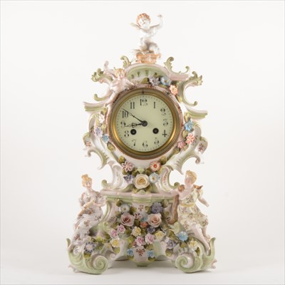 Lot 118 - A Continental porcelain mantel clock
