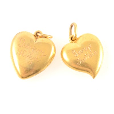 Lot 267 - A Russian yellow metal heart-shaped locket and another similar locket.