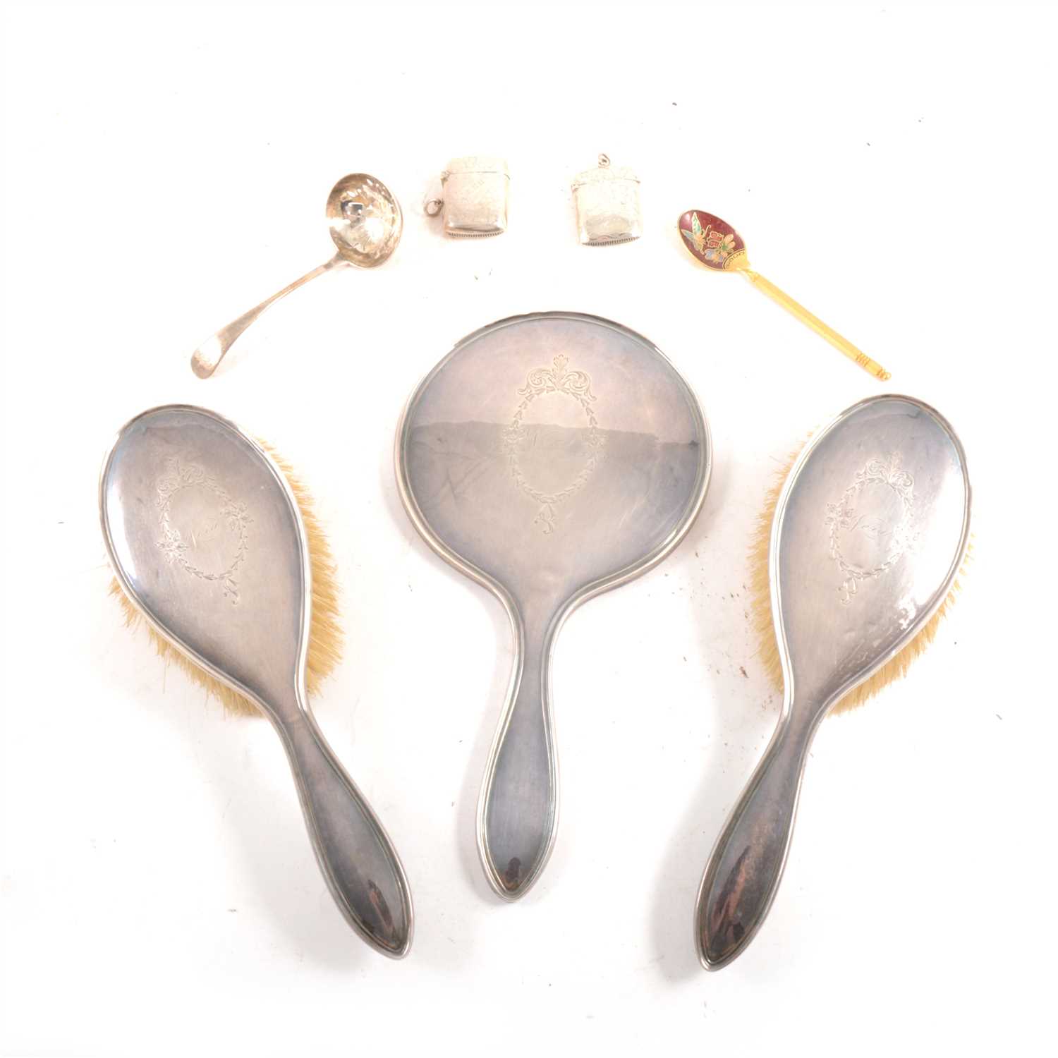 Lot 196 - Silver vestas, sifter spoon, napkin rings, hand mirror and two brushes