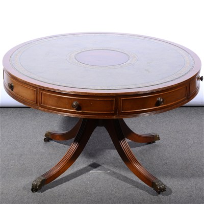 Lot 617 - A reproduction mahogany drum top coffee table