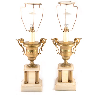 Lot 200 - A pair of brass and onyx table lamps