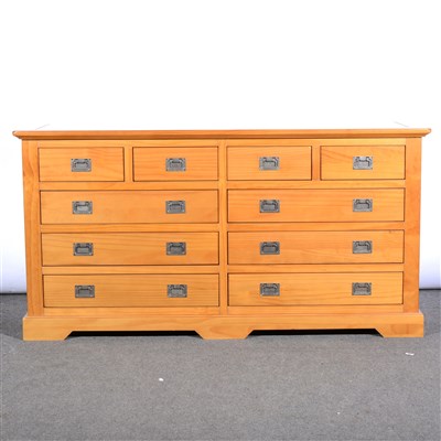 Lot 518 - A contemporary blonde wood double chest of drawers, ...