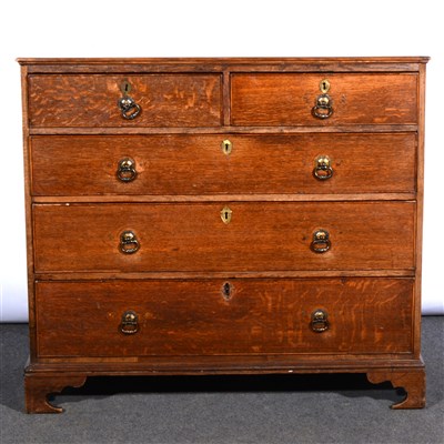 Lot 515 - A George III oak chest of drawers