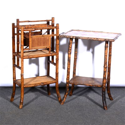 Lot 486 - An Edwardian bamboo and cane paper rack, and similar table