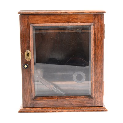 Lot 123 - A small oak smoker's cabinet