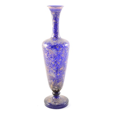 Lot 5 - A blue glass vase