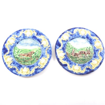 Lot 6 - A pair of majolica plates, relief decorated with deer and hares