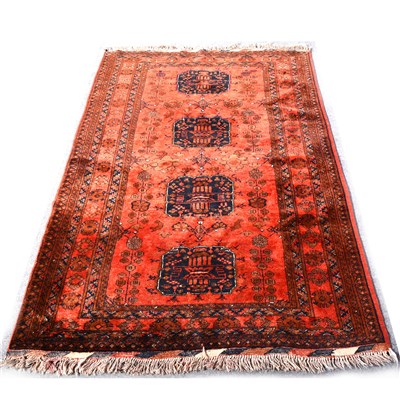 Lot 545 - Two Bokhara rugs, one with red ground, one with salmon ground