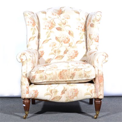 Lot 525 - A contemporary wing-back easychair, floral print cotton upholstery, ...