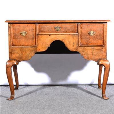 Lot 409 - George III style walnut lowboy