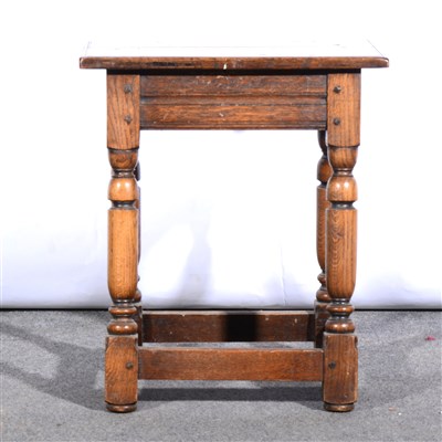 Lot 412 - A reproduction joined oak stool