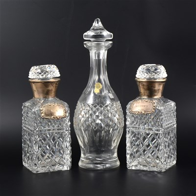 Lot 185 - Pair of silver mounted spirit decanters, with...