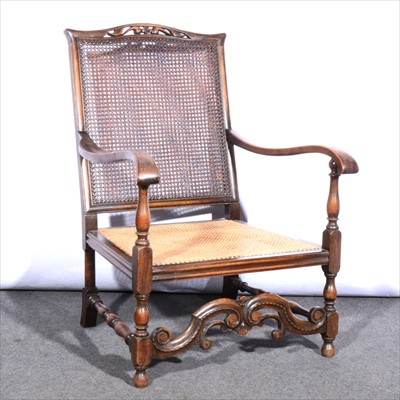 Lot 504 - Edwardian stained walnut and beechwood elbow chair