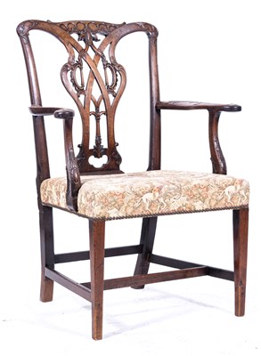 Lot 460 - A Chippendale style mahogany elbow chair, possibly Irish, late 18th Century