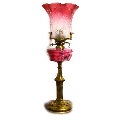 Lot 204 - A brass based oil lamp, ...