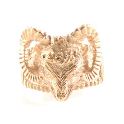 Lot 218 - A 9 carat yellow gold rams head dress ring,.