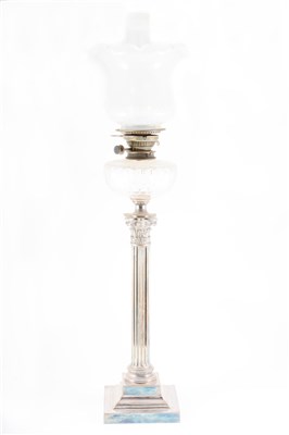 Lot 114 - An Edwardian silver plated and cut glass oil lamp