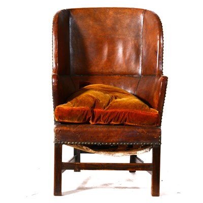 Lot 455 - A George III style studded brown leather easy chair