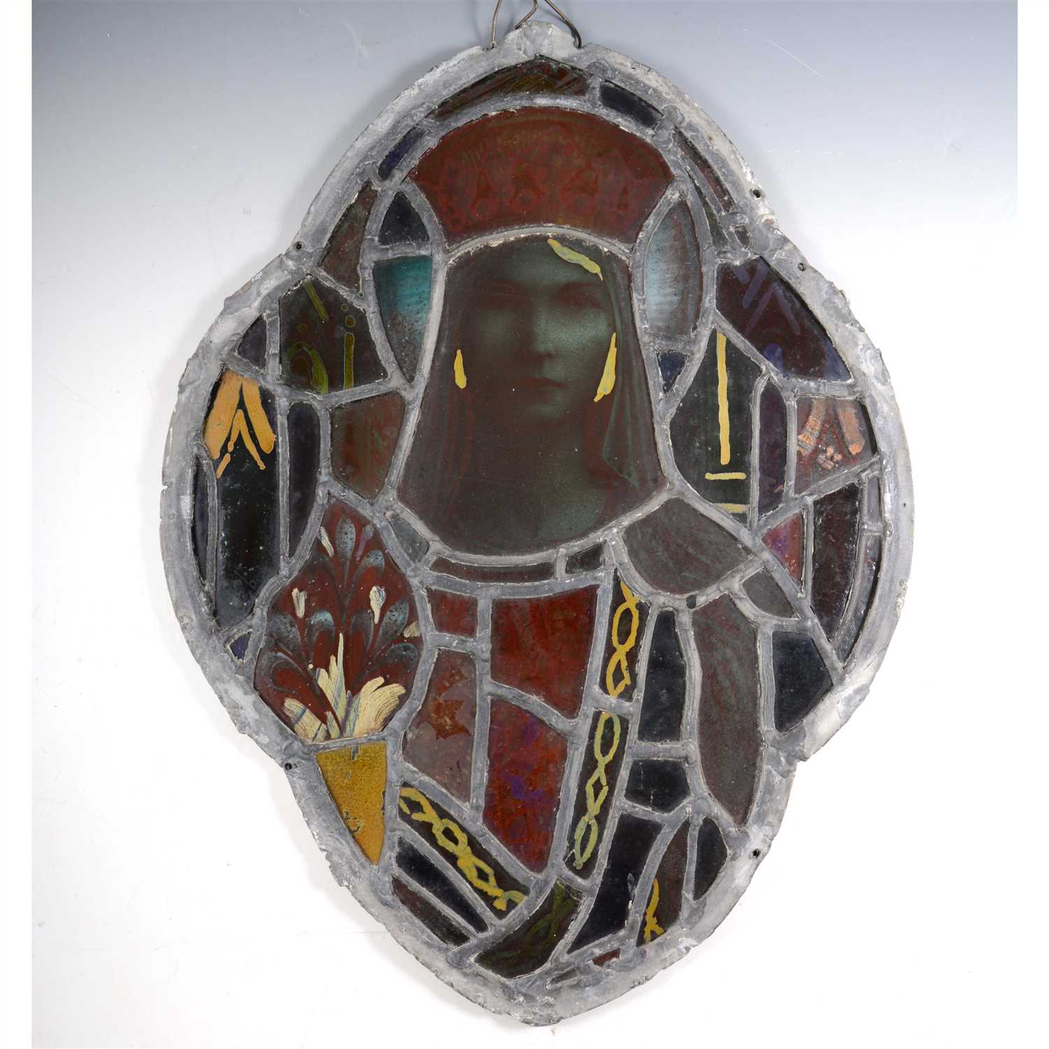 Lot 8 - A Victorian stained and leaded glass panel, depicting a female saint
