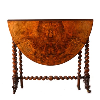 Lot 486 - A Victorian figured walnut and inlaid Sutherland table