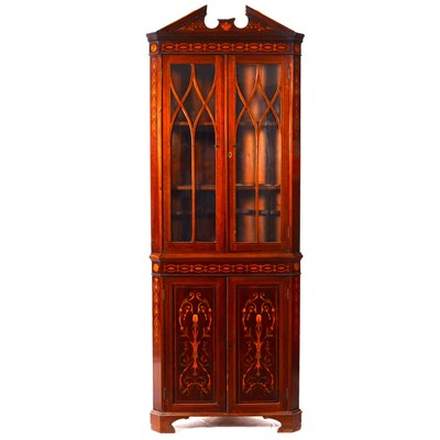 Lot 503 - An Edwardian inlaid mahogany free-standing corner cupboard, in the style of Maple & Co