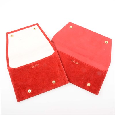 Lot 278 - Cartier - two red jewel pouches.