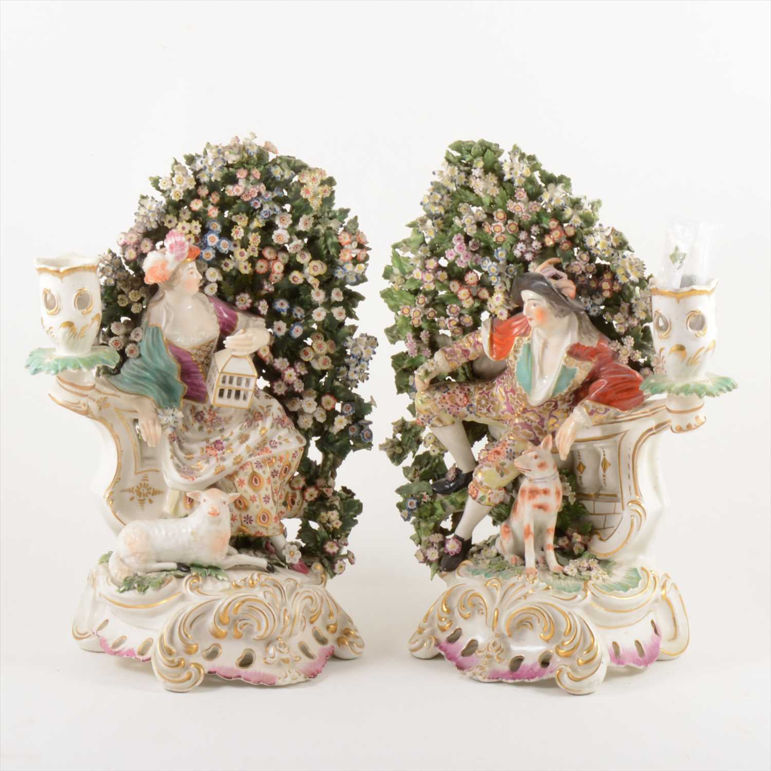 Lot 505 - A pair of Derby brocage candlesticks