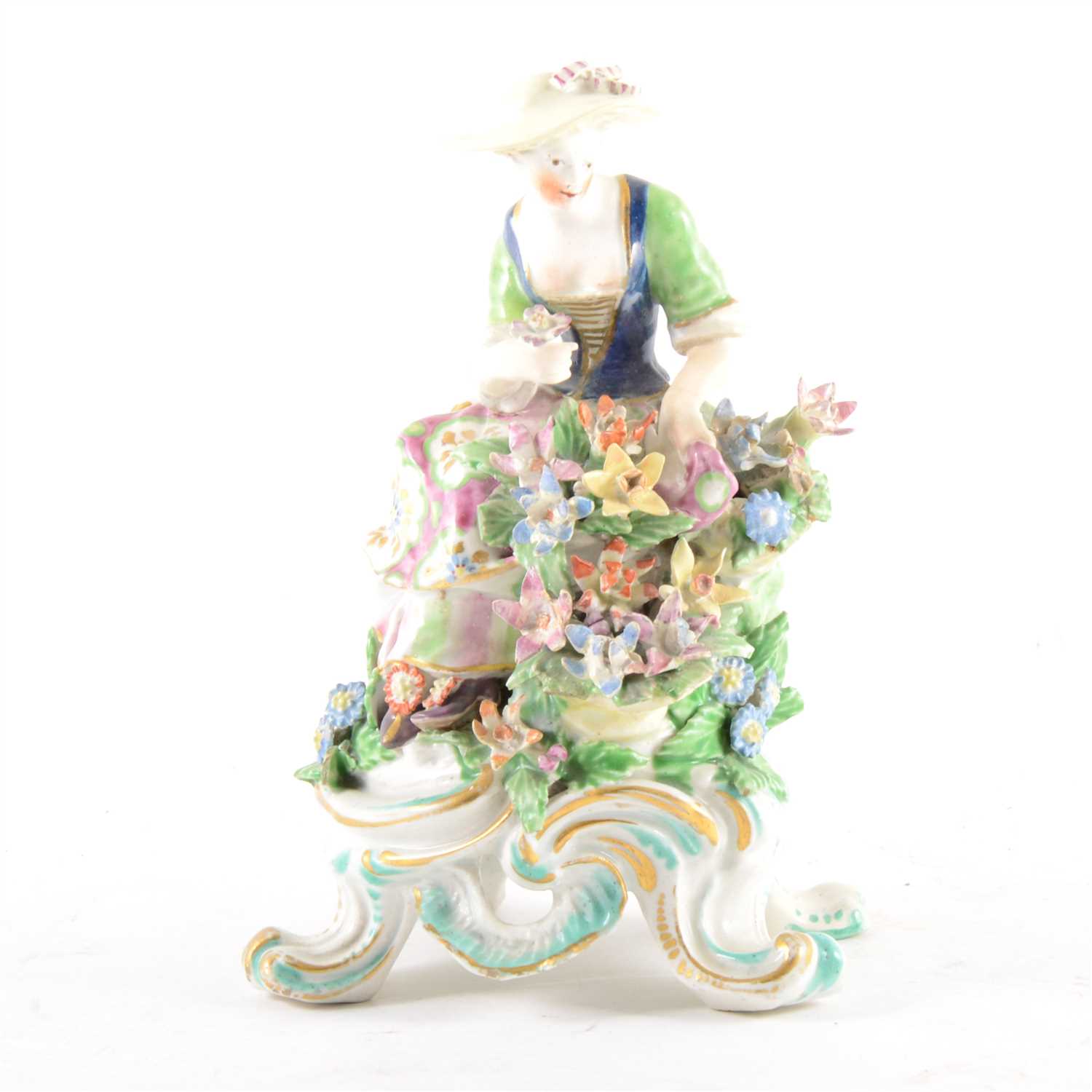 Lot 77 - A Derby figure of a young lady, with flowers, ...