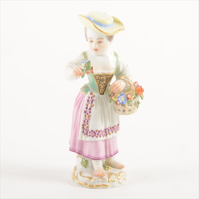 Lot 66 - A Meissen porcelain figure, flower girl by a table, from the the Senses series