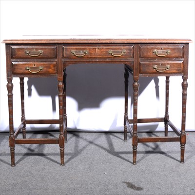 Lot 654A - An Aesthetic period five drawer desk by Collinson & Lock, London.