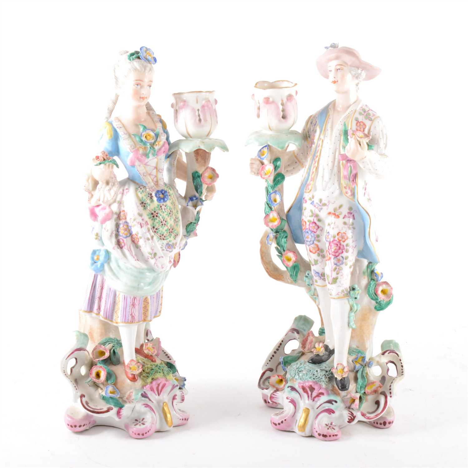Lot 5 - A pair of continental porcelain figural candlesticks, probably French, ...