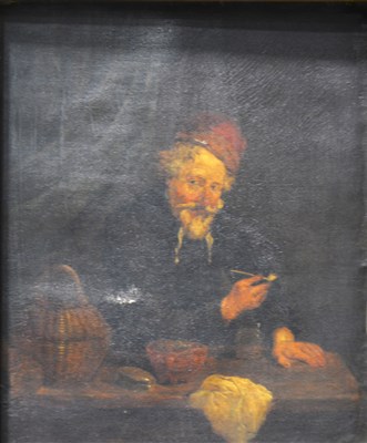 Lot 515 - Follower of Adriaen van Ostade, Figure by a table smoking a pipe, oil on canvas