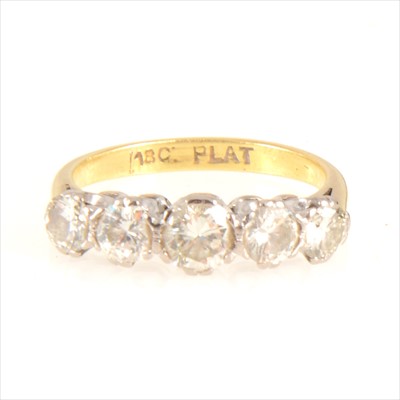 Lot 660 - A diamond five stone ring.