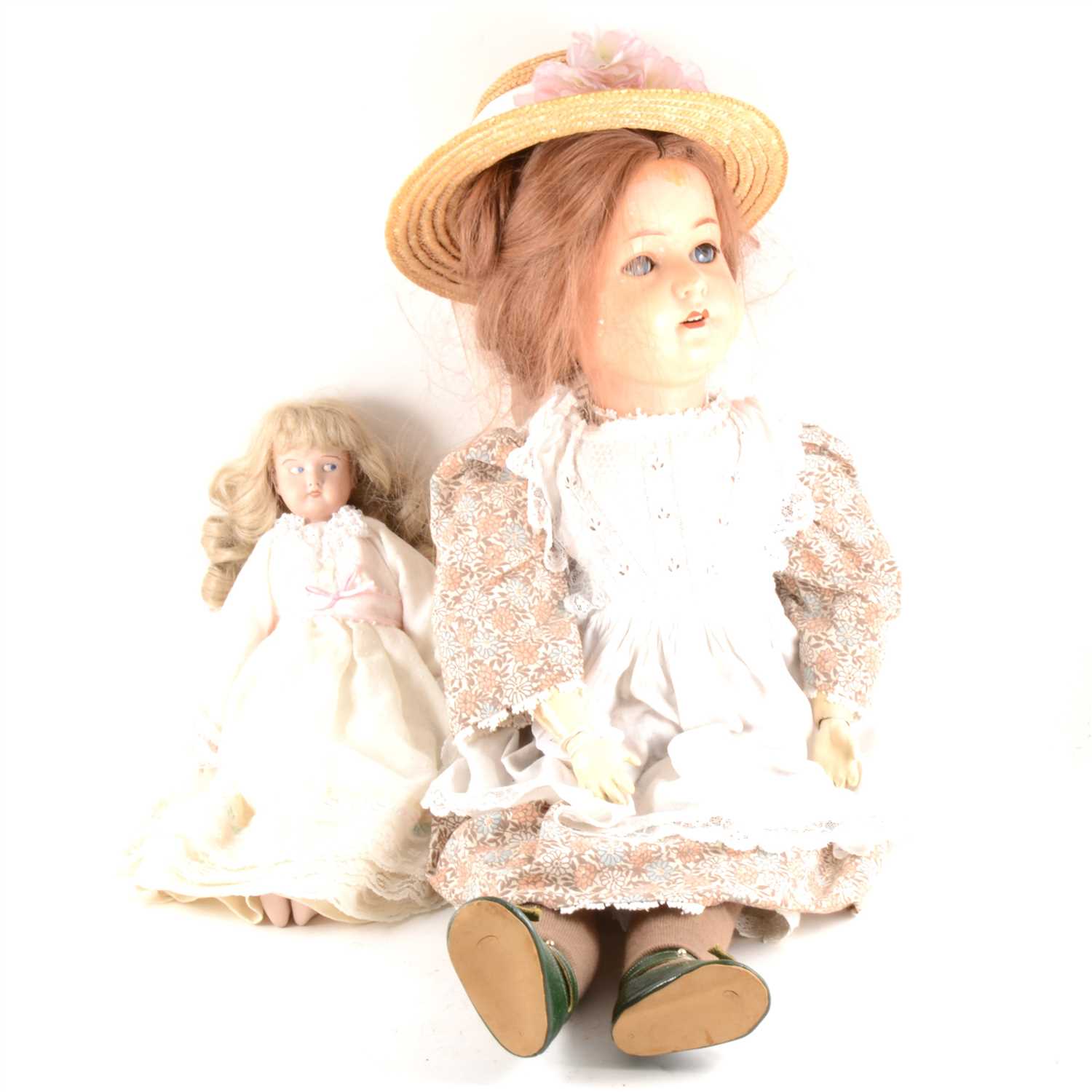 Lot 109 - An early 20th Century composition head doll by Heubach Koppelsdorf, and a modern doll.