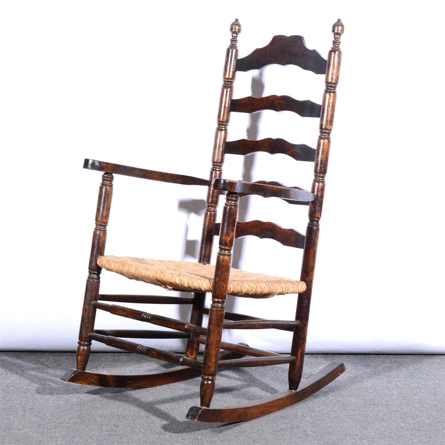 Stained Rocking Chair Lot 435 - Stained beechwood rocking chair,
