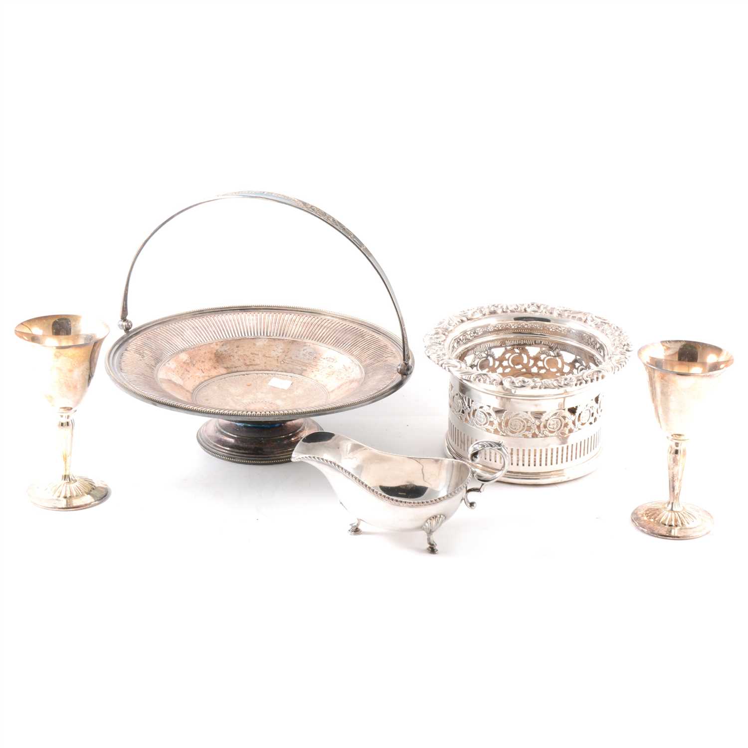 Lot 135 - Silver-plated ware, a pair of bottle coasters, entree dish, pair of sauce boats, trophies, flatware etc.