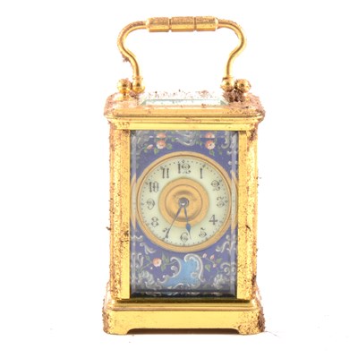 Lot 115 - A small enamelled carriage clock.