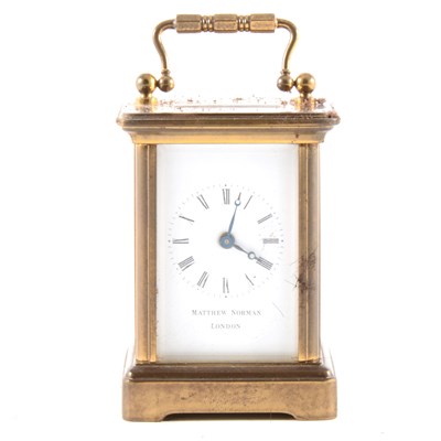 Lot 173 - A small carriage clock.