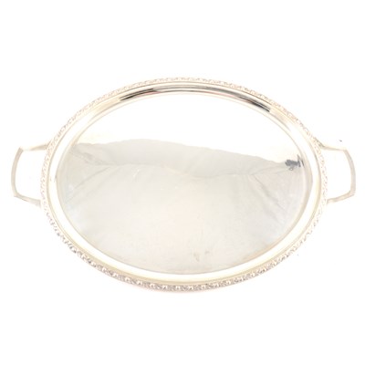 Lot 264 - An oval silver twin handled tea tray by A E Jones.