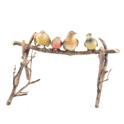 Lot 166 - After Bergman, four cold painted birds on a branch