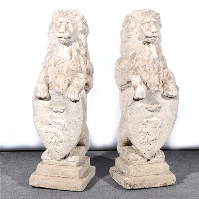 Lot 499 - Garden statuary,  a pair of stoneware lions.