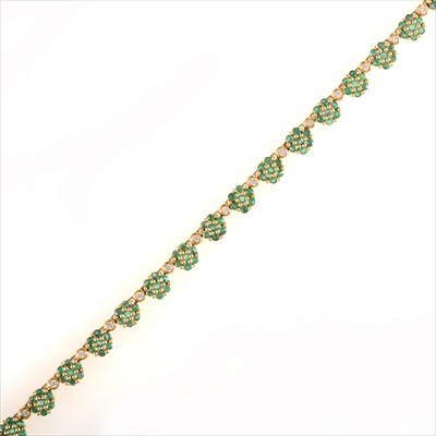 Lot 676 - An emerald and diamond necklace.